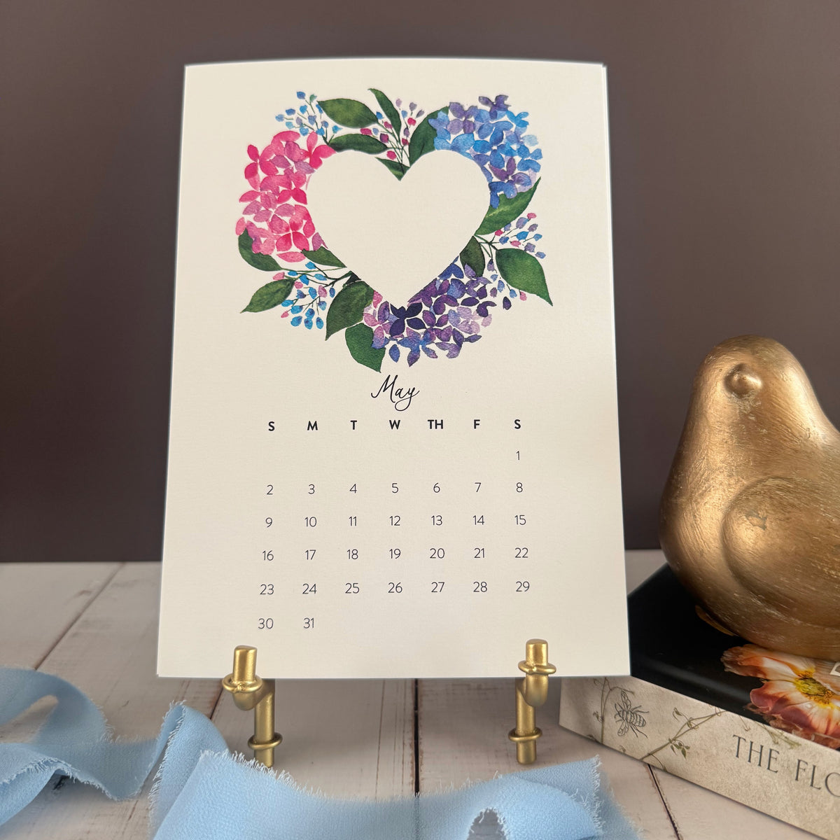 May page with a heart wreath of pink and purple hydrangeas