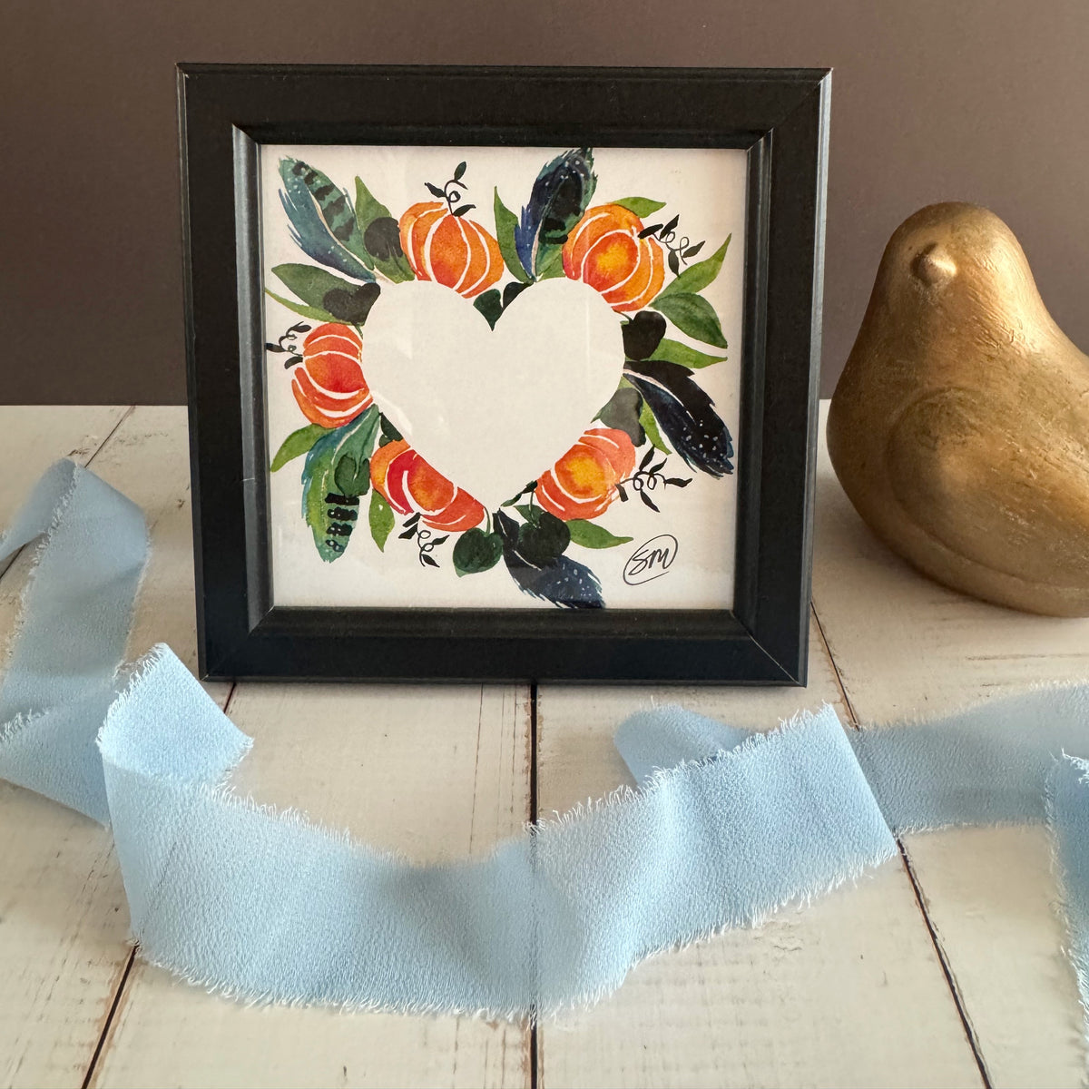 Watercolor wreath trimmed and framed in a small black 4x4 frame